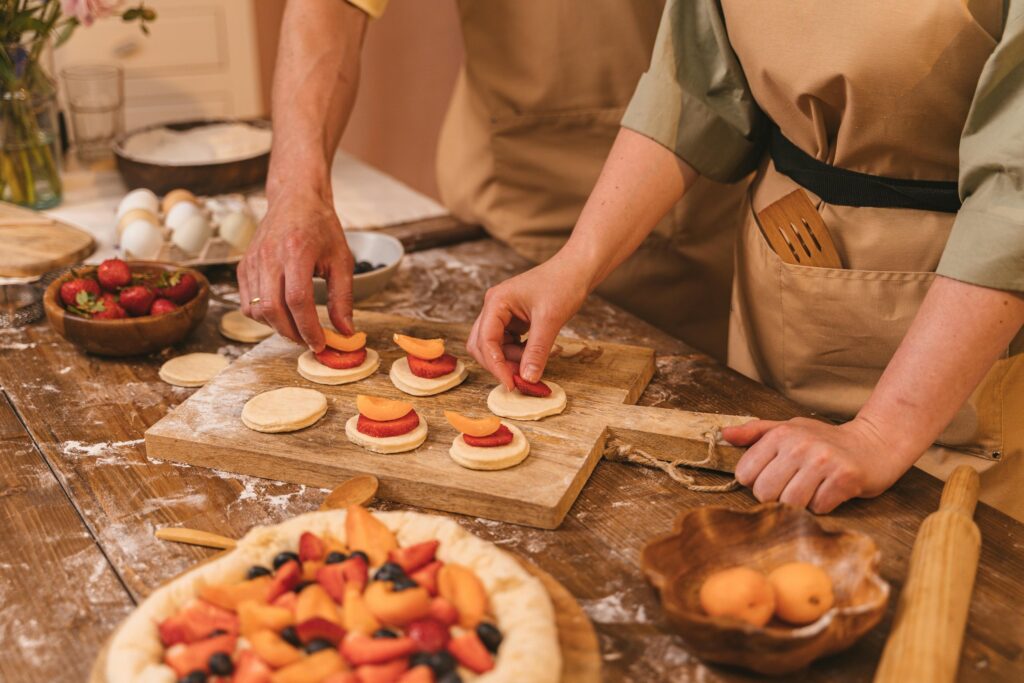 couple cooking preparing food