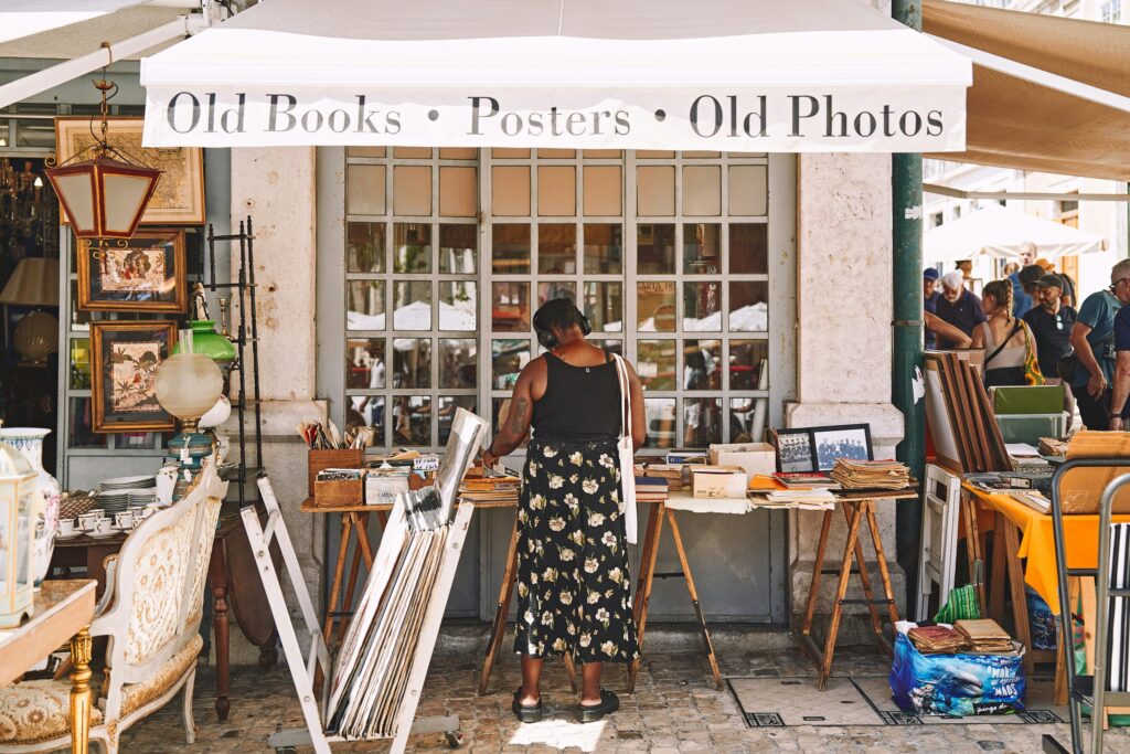 woman shopping outdoor bookstore market