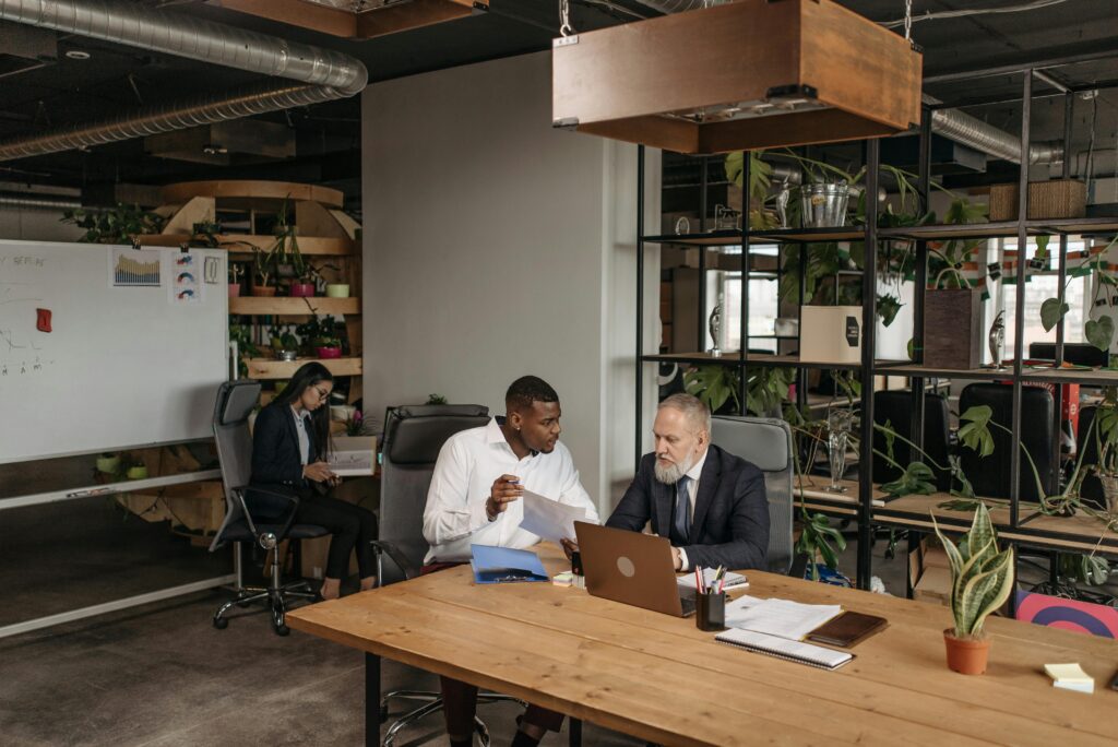 2 business men meeting in an office