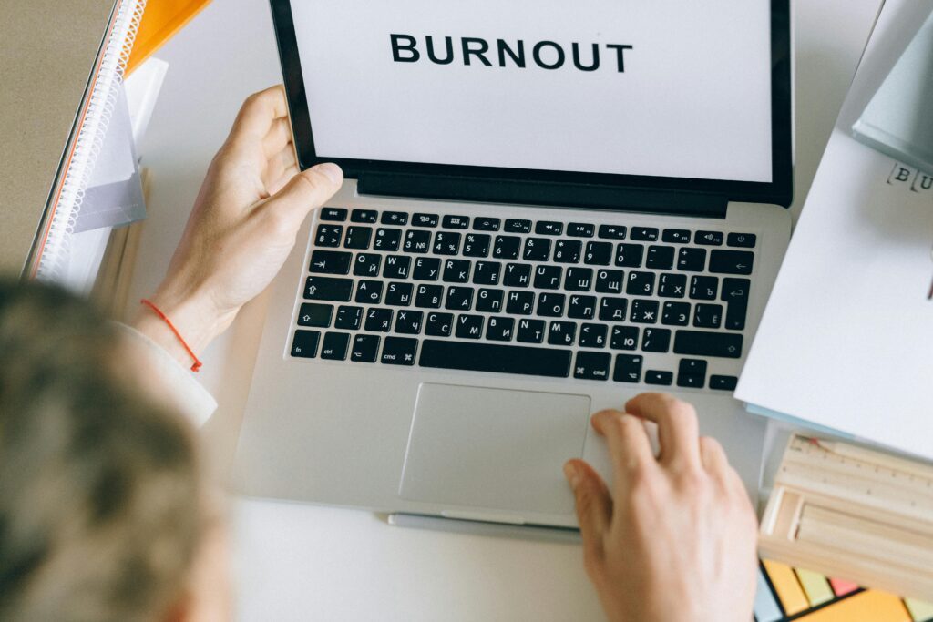 laptop with words burnout on the screen