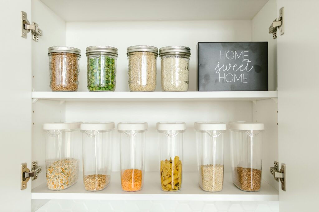 organized pantry with jars lined up.